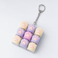 Paw Pad Pop It Keychain - Cream & Purple