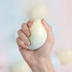 Crispy Bubble Squishy Ball - Rainbow - squeeze in hand
