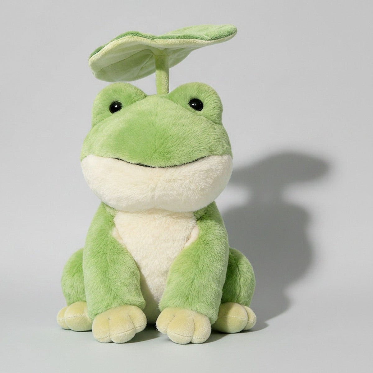 Adorable Green Frog Plush Toy With Lily Pad – novelty & toys (view 1)