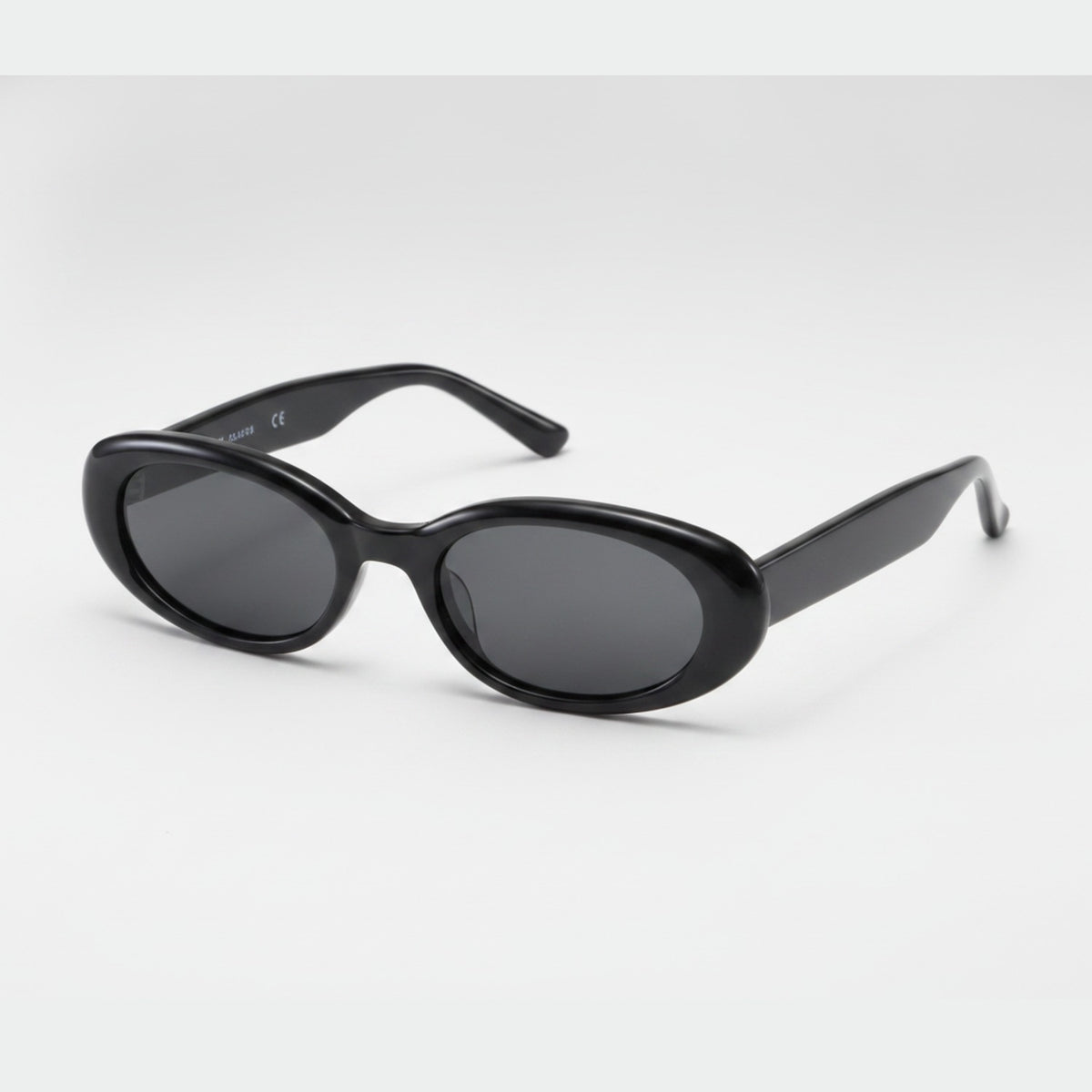 Tortoiseshell Oval Sunglasses with Dark Lenses - Glossy Black Frame Gray Lens – eyewear (view 1)