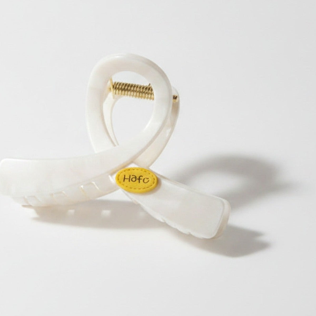 Cream Pearl Hair Claw With Gold Charm – hair accessories (view 1)