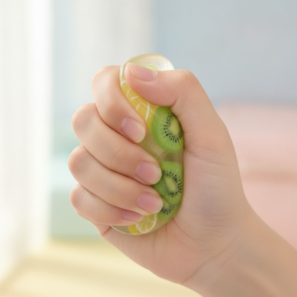 Citrus Slice Jelly Squishy - Blue - squeeze in hand