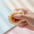 Squishy Pastry Charm - Cheese Mochi - squeeze in hand