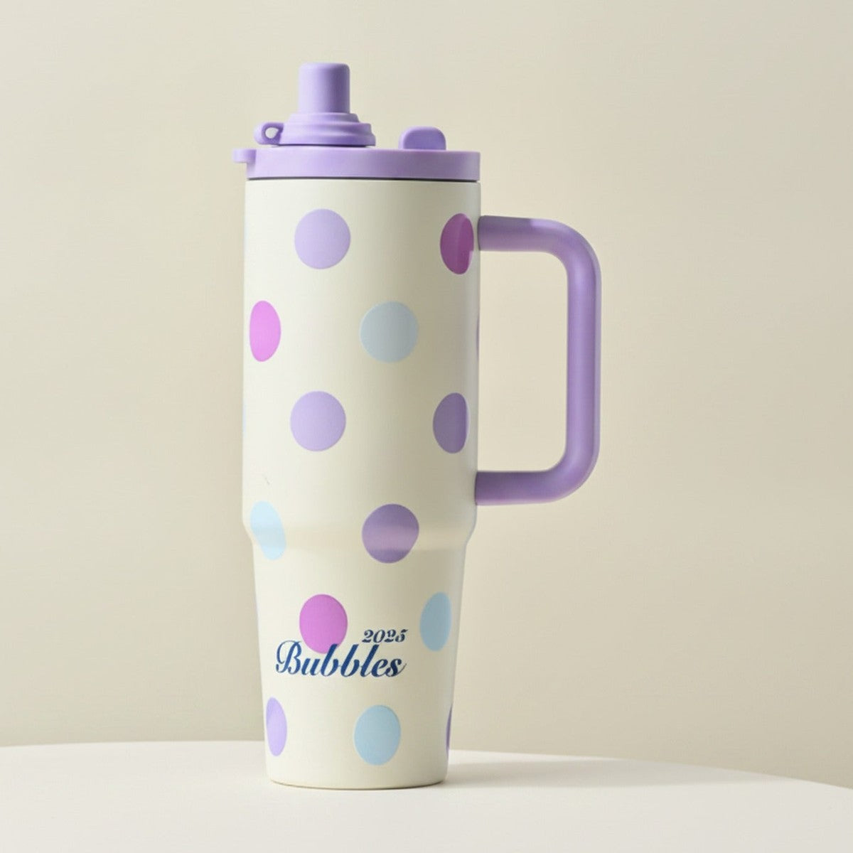 Cream Polka Dot Tumbler With Purple Handle – novelty & toys (view 1)