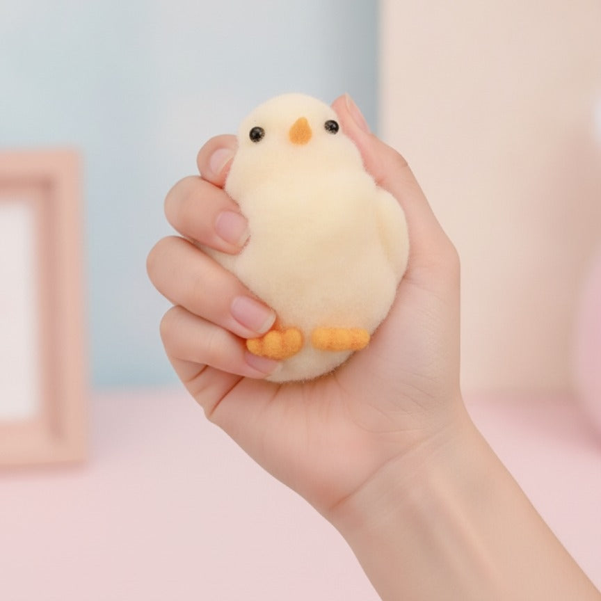 Cream Chick Squishy Trio With Wood Base - squeeze in hand