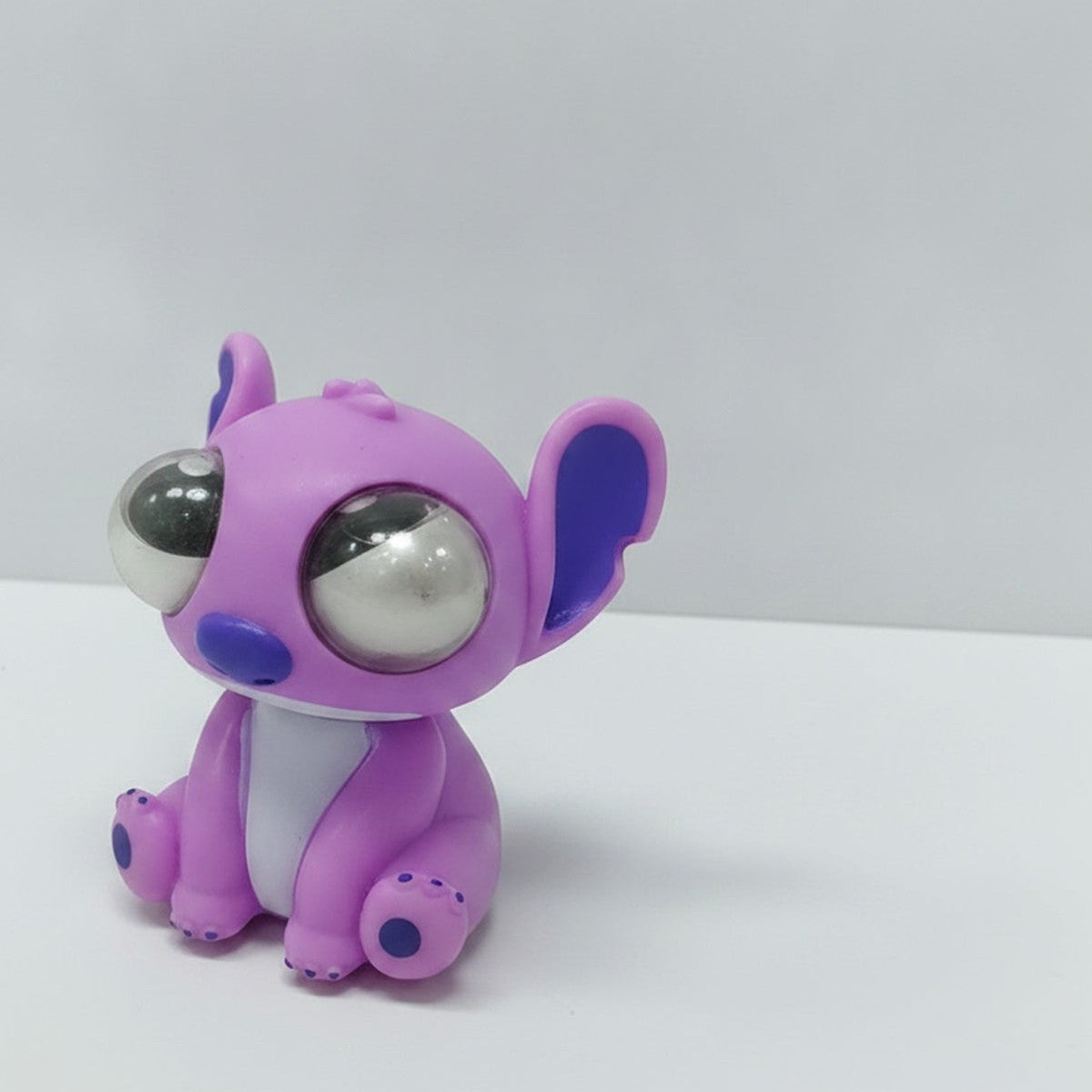 Pop‑eyed Squeeze Squishy Toy - Purple