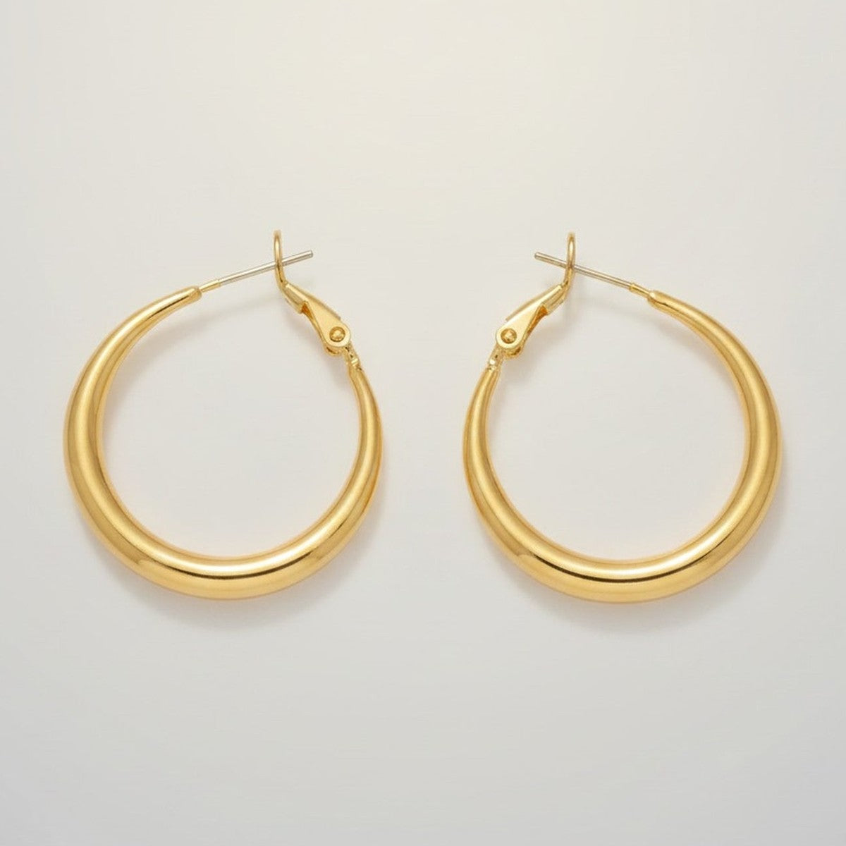Sleek Gold Tone Hoop Earrings – jewelry (view 1)