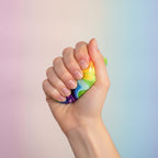 Trippy Eyes Squishy Cube - Fluid Rainbow - squeeze in hand