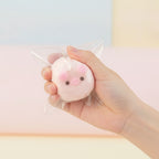 Mini Pig Squishy Buddy - Blush Pink - squeeze in hand