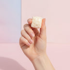 Swiss Cheese Block Shaped Candles - squeeze in hand