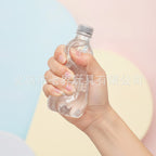 Water Bottle Squishy Toy - Clear - squeeze in hand