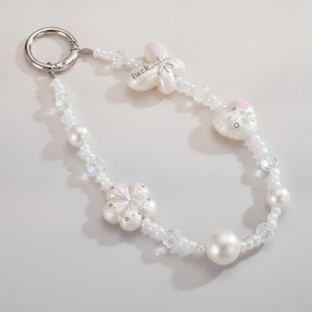 Pearlescent Beaded Phone Charm with Charms – jewelry (view 1)