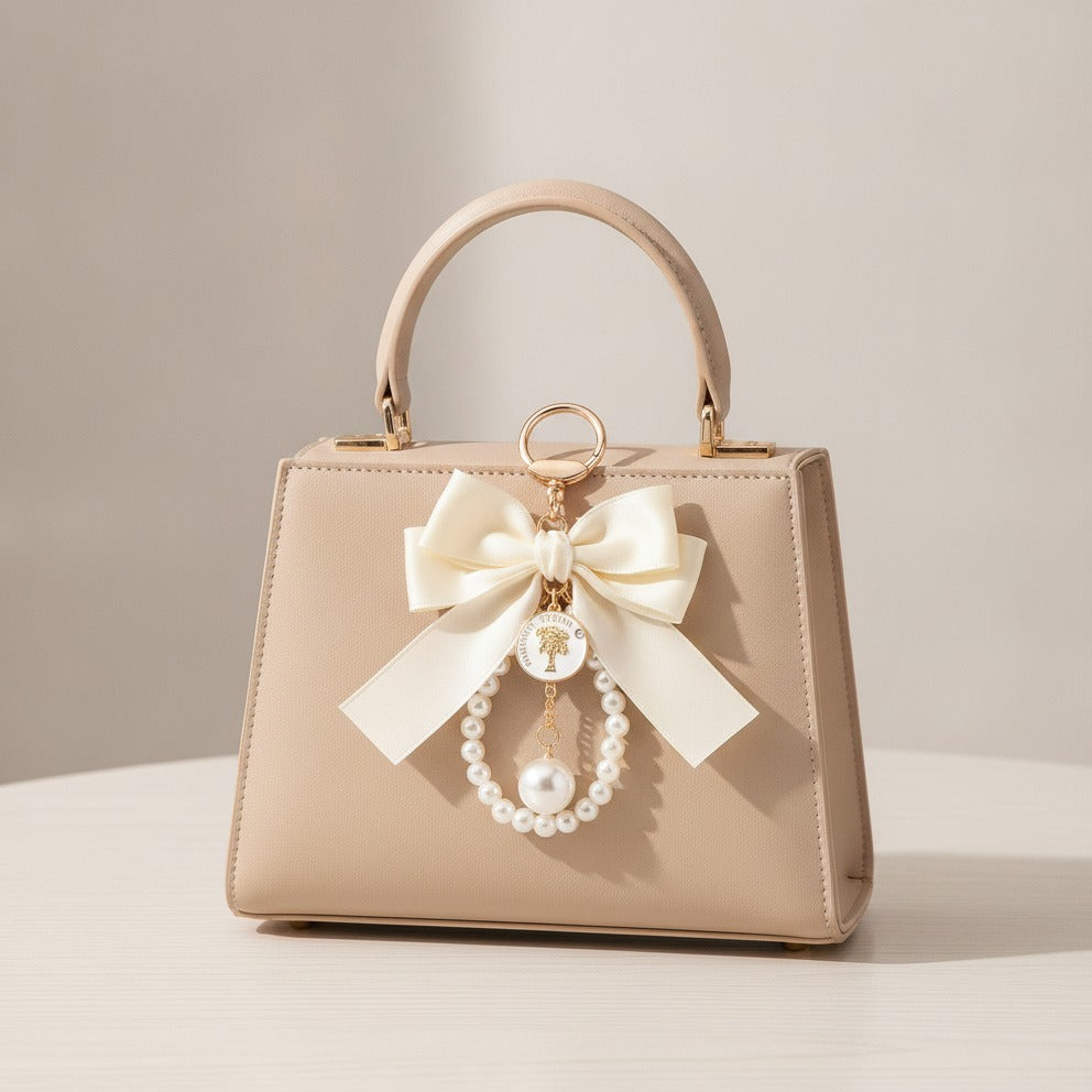 Coin Pearl Bow Bag Charm - Cream