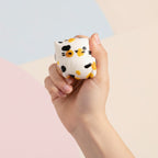 Kitty Cat Squishy Plush Toy - Cream & Gold - squeeze in hand