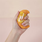 Croissant Squeeze Squishy - Butter - squeeze in hand