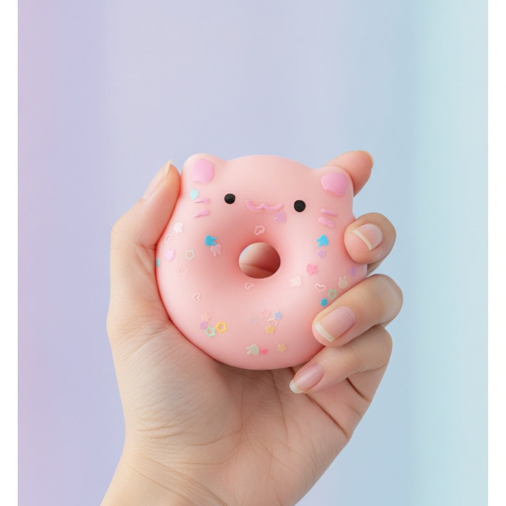 Cat Donut Hard Toy with Sprinkles - Pink Donut - squeeze in hand