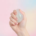 Sparkling Texture Squishy Ball - Clear - squeeze in hand