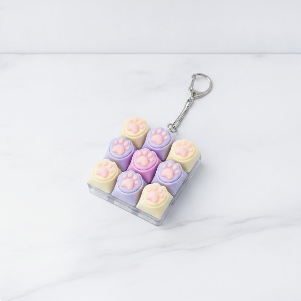 Paw Pad Pop It Keychain - Cream & Purple