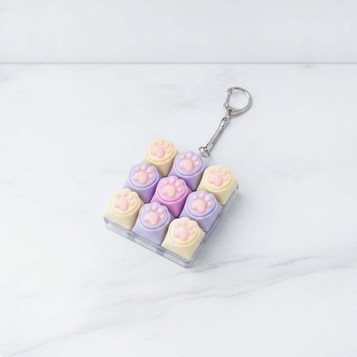 Paw Pad Pop It Keychain - Cream & Purple