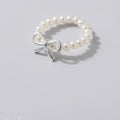 Pearl Beaded Ring With Silver Bow Charm – jewelry (view 1)