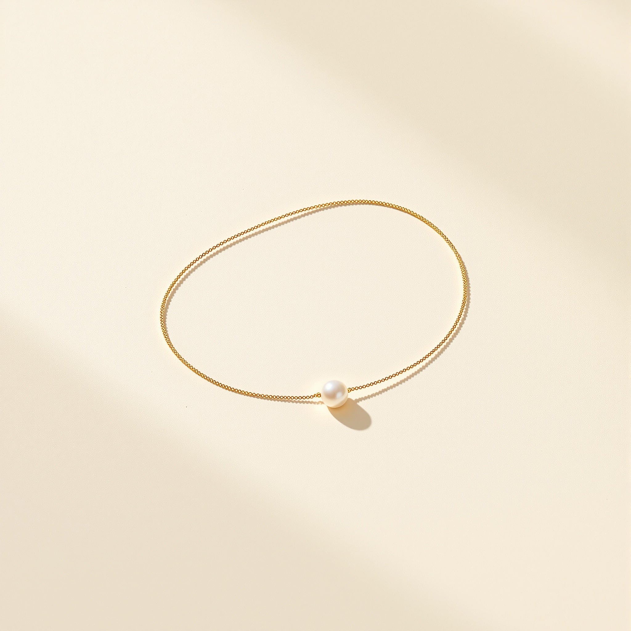 Pearl pendant necklace and gold rings